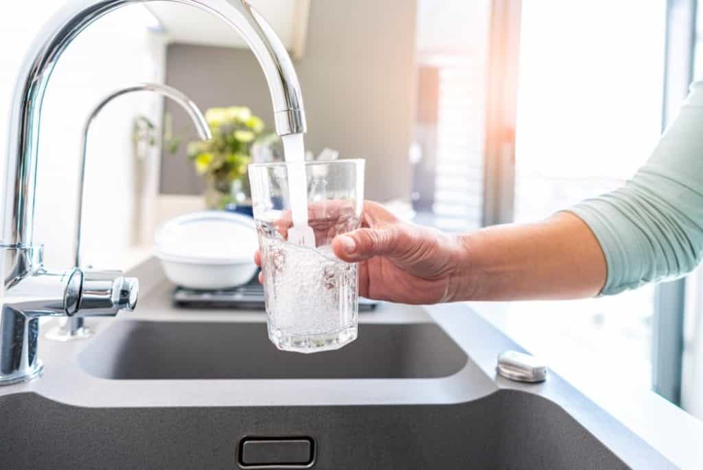 A Glass Being Filled With Tap Water | Quality Water